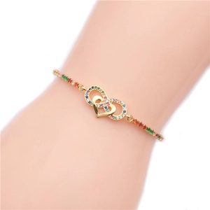 Colorful zircon heart-shaped gold adjustable bracelet worn on model wrist
