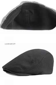 Detail of adjustable elastic back strap on black beret cap for head size 55-59cm
