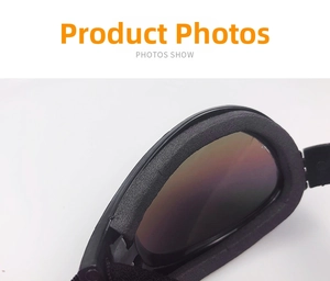 Detail view of pet goggles with thick black sponge padding and dark red coated lens
