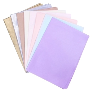 Multi-color tissue paper sheets in purple, pink, and gold for flower bouquet wrapping
