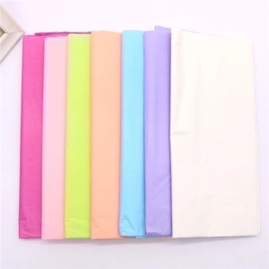 Detailed view of colorful tissue paper sheets for flower and gift packaging