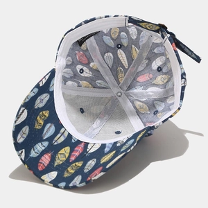 Navy blue baseball cap with colorful feather print and six-panel interior structure