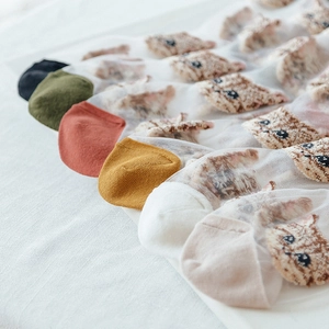Cute sheer mesh socks featuring cartoon cat patterns in various colorful toe accents