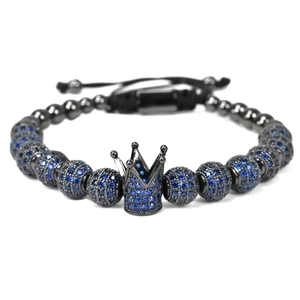 Adjustable crown charm bracelet with blue zircon beads and black metallic base