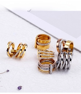 Detailed display of three-tone 18k gold plated stainless steel multi-layer stacked rings