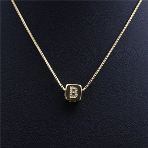 Gold letter B cube necklace with micro-pave cubic zirconia on a box chain for women