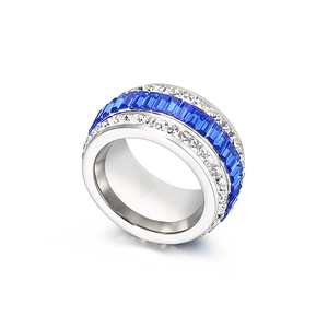 Silver stainless steel ring featuring rectangular blue stones and pavé set white diamonds