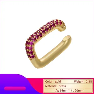 Gold plated brass ear cuff featuring purple-red cubic zirconia in a rectangular U-shape