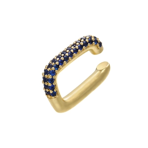Macro shot of gold-plated ear cuff with micro-pave rectangular blue zircon stones