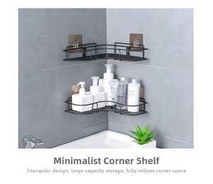 Detail of two-piece black metal corner shower caddies with adhesive hooks on grey tiles