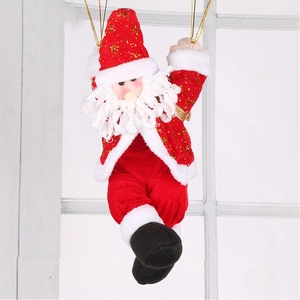 Close-up of plush Santa Claus pendant with gold glitter accents for Christmas decor