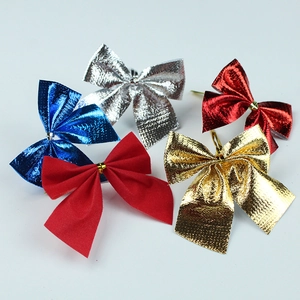 Assorted 5.5cm glitter and flocked mini bows in five vibrant colors for Christmas decor