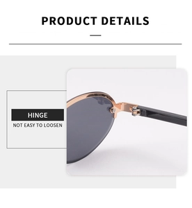 Detail shot of the reinforced metal hinge on luxury oval rimless sunglasses