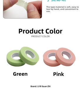 Close-up of easy-to-tear breathable non-woven lash tape in green and pink for lash extension