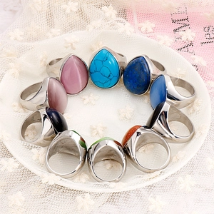Retro stainless steel rings with teardrop gemstones in various colors on lace