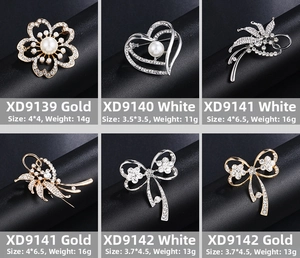 Detailed grid showing pearl and rhinestone flower brooches in gold and silver finishes