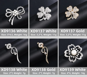 Detailed grid of crystal pearl brooches with alloy floral and clover designs on black