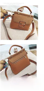 Detailed front and back view of brown leather crossbody bag with gold hardware buckle
