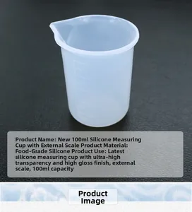 Macro shot of a 100ml silicone measuring cup featuring clear external scale markings
