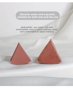 Close-up of dual hydrophilic non-latex makeup sponges on silk background