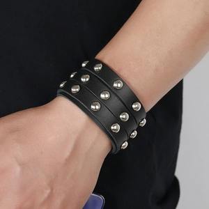 Punk style black genuine leather wrap bracelet featuring three rows of silver metal studs