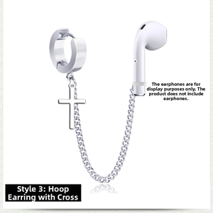 Detail of silver cross earring with anti-lost chain for wireless headphones, steel