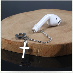 Detail of silver stainless steel cross earring with anti-lost chain for wireless earbuds