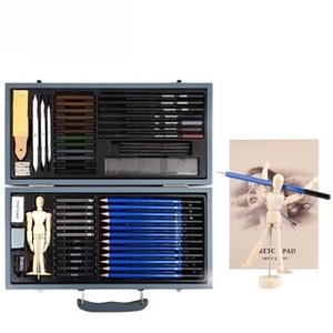 Macro view of professional sketching set with pencils, sketch pad and mannequin