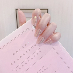 Long almond aurora pink iridescent press-on nails with shiny mermaid pearl finish