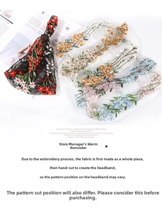 Detail of four colorful floral embroidery mesh headbands with delicate lace textures