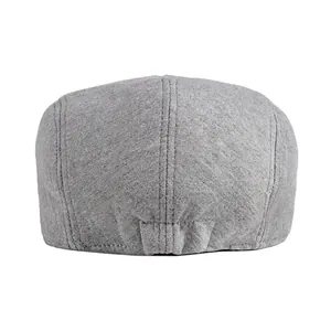 Back view of a light grey knitted flat cap with an adjustable elastic back for men