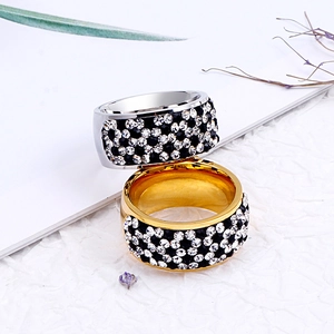 Exaggerated wide band rings in gold and silver finish with pave black and white rhinestones