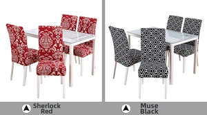 Detail view of stretch chair covers in red damask and black geometric diamond patterns