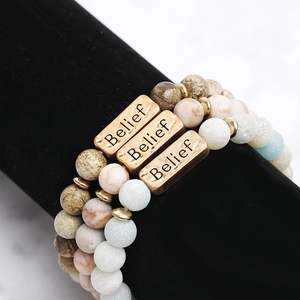 Three-piece natural stone bead bracelet set with engraved bronze Belief metal charm