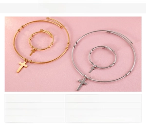 Detailed view of gold and steel cross necklace set with product size and weight specs