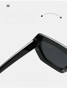 Macro detail of a durable texture hinge on black oversized square sunglasses