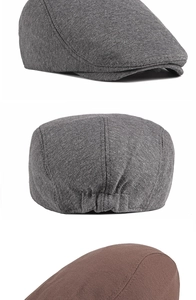 Detail view of cotton-linen blended beret hats in dark grey and brown colors