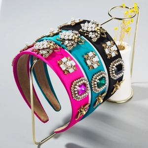 Baroque wide headbands featuring luxury rhinestones, pearls, and golden bee accents