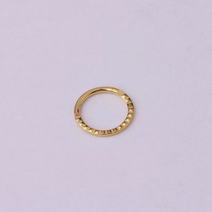 Golden 316L stainless steel hinged ring with textured diamond-cut pyramid pattern