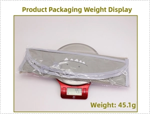 Gray mesh storage bag with shark pattern showing 45.1g package weight on scale
