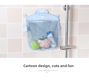 Close-up of a blue cartoon bear mesh bag with suction cups holding bath accessories