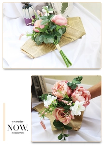 Detail of bridal bouquet featuring pink peonies and eucalyptus leaves for weddings