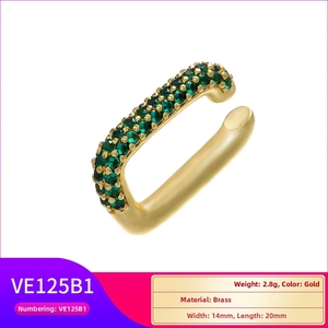 Macro shot of 14x20mm gold brass ear cuff with rows of dark green inlaid zircons