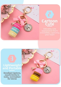 Detailed view of 3-layer macaron keychain with pink ribbon and Eiffel Tower charm