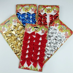 Close-up of set of 12 velvet and foil mini Christmas bows in 5 colors for tree decor
