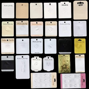Various jewelry display cards in multi-color cardboard for earrings and necklaces