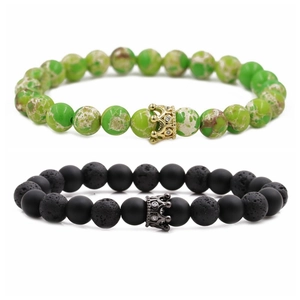 Detail shot of 8mm lava stone beads and turquoise bracelets with studded crown charms