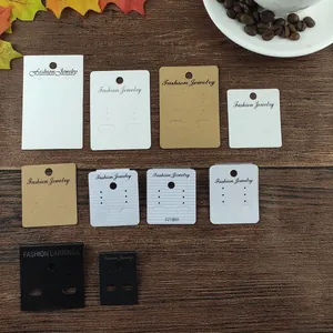 Assorted jewelry display cards in white, black and kraft paper for earrings and necklaces