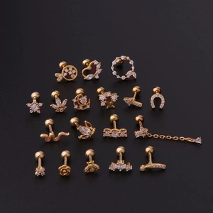 Variety of 16G stainless steel cartilage studs with gold plating and zircon stones