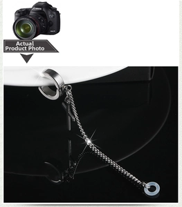 Detail of anti-lost steel earring with cross pendant, long chain and silicone loop